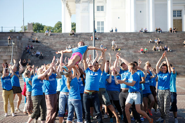 UNICEF's Face-to-face -recruiters in their flash mob -happening at Senate Square in Helsinki.
